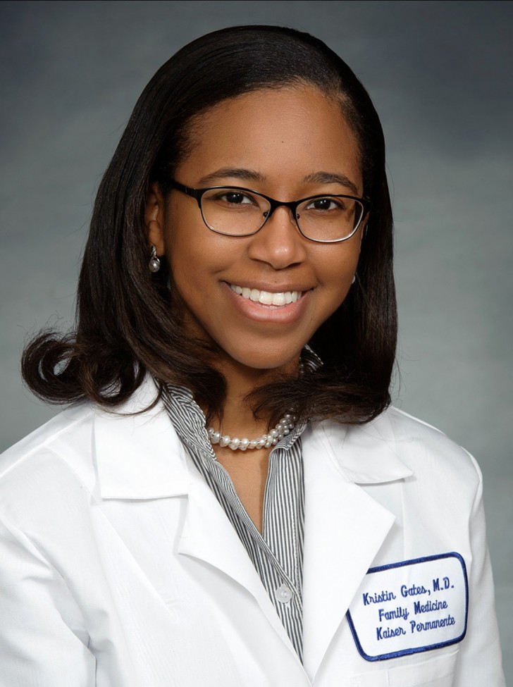 一位身穿白大褂的非裔美国女医生的画像
